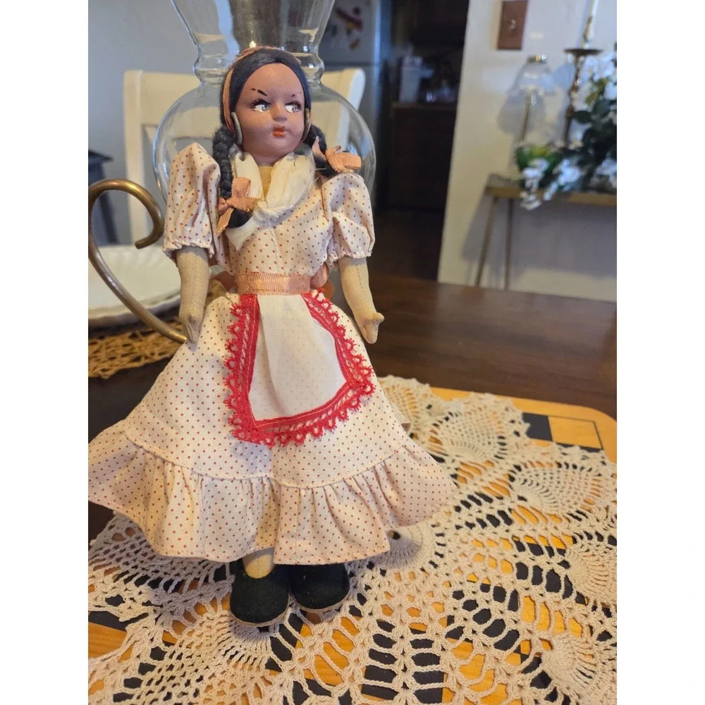 vintage Argentine gaucho folk art doll featuring a hand-painted face